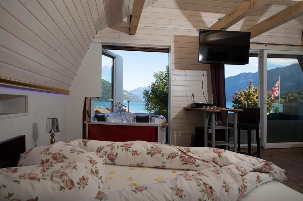 Strandhotel Seeblick Faulensee Екстериор снимка