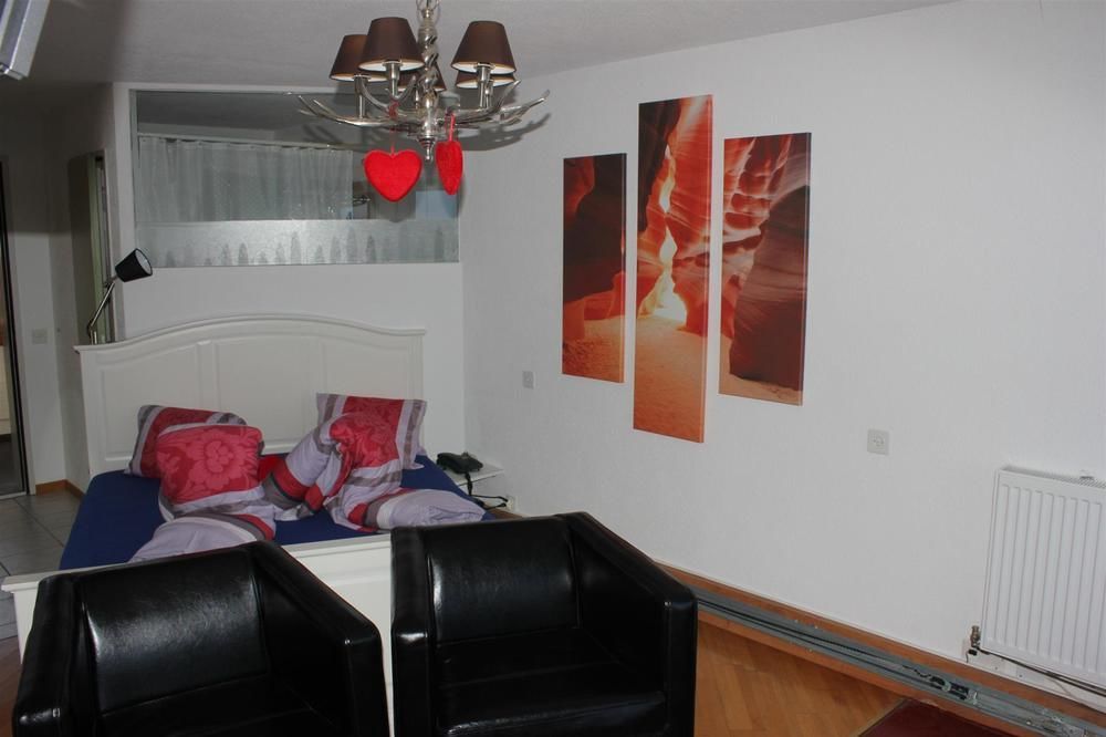 Strandhotel Seeblick Faulensee Екстериор снимка