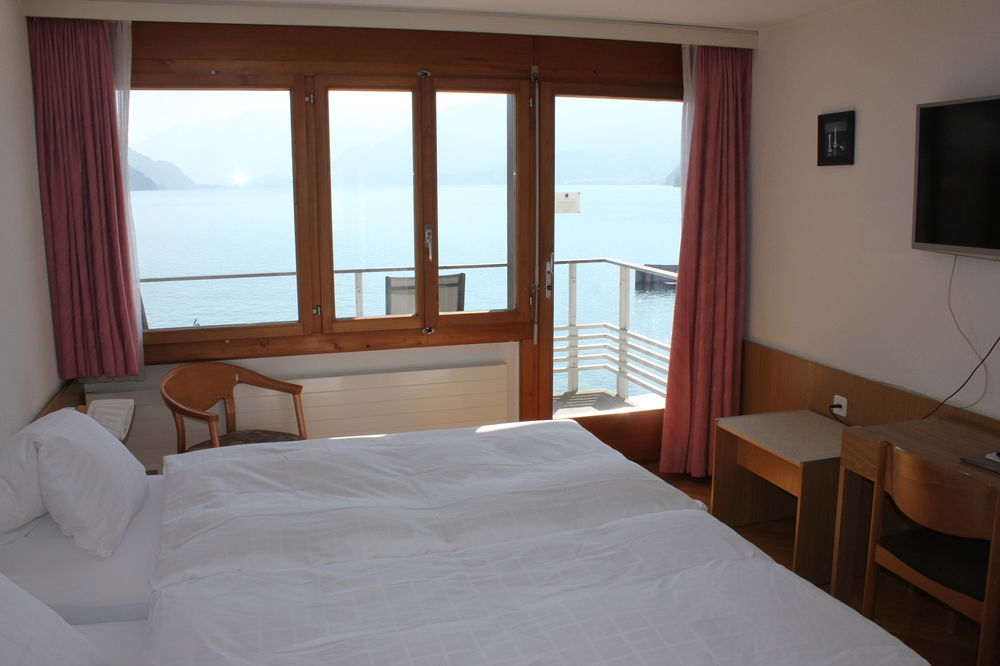 Strandhotel Seeblick Faulensee Екстериор снимка