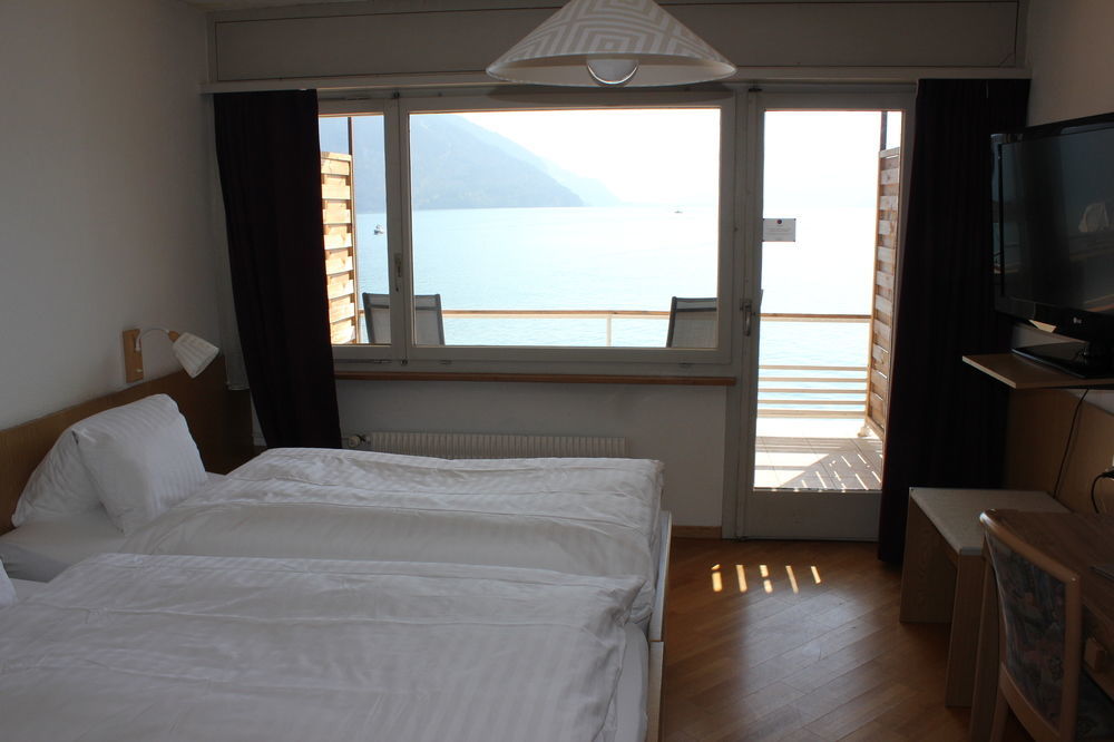 Strandhotel Seeblick Faulensee Екстериор снимка