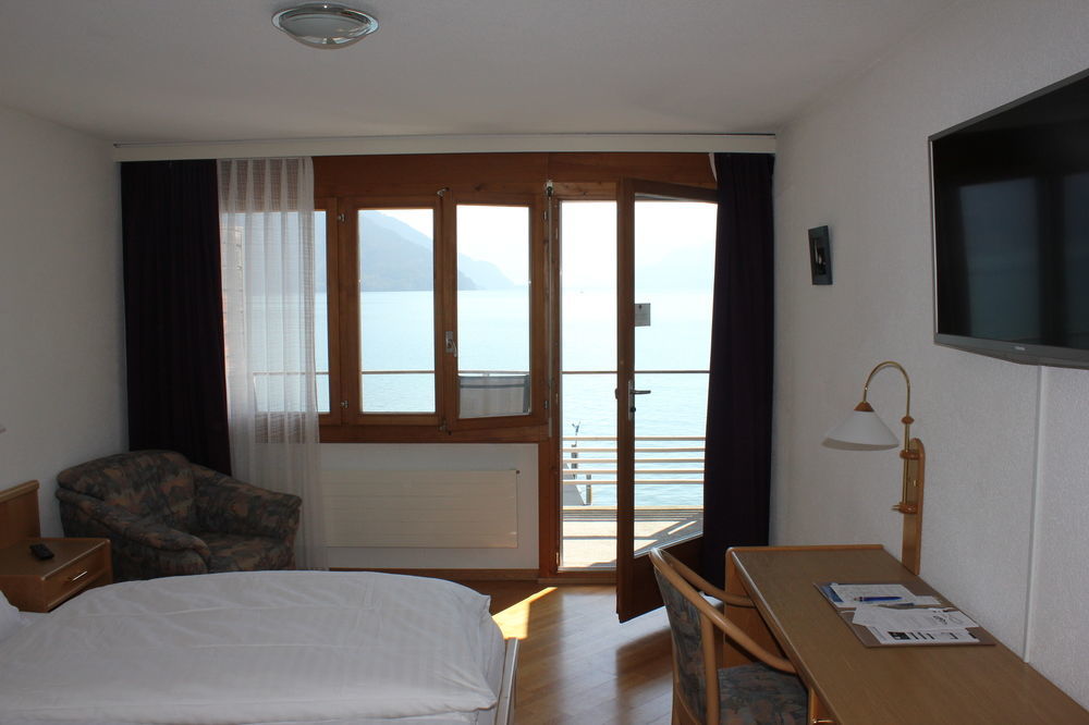 Strandhotel Seeblick Faulensee Екстериор снимка